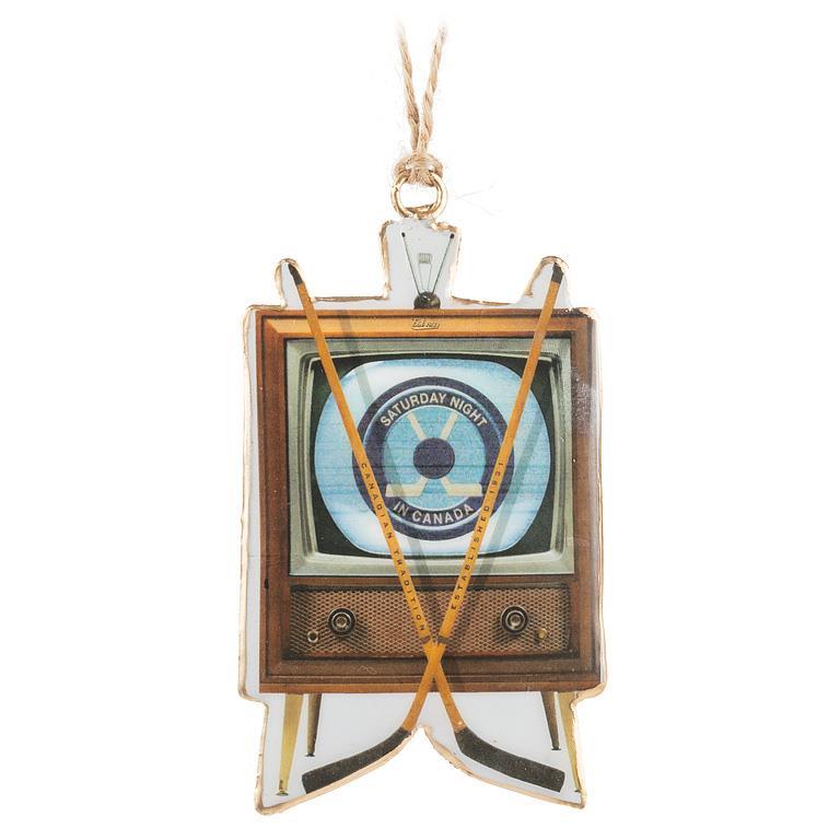 VINTAGE TV WITH HOCKEY STICK ORNAMENT